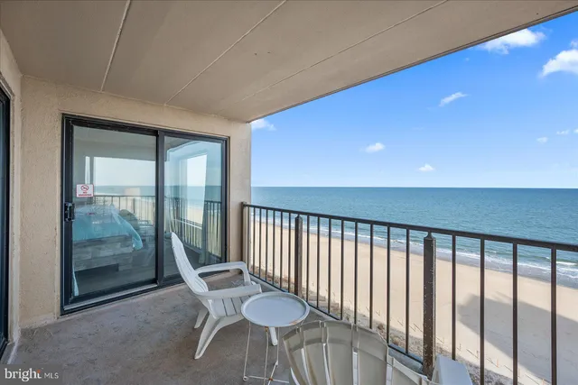 a view of a balcony with chairs
