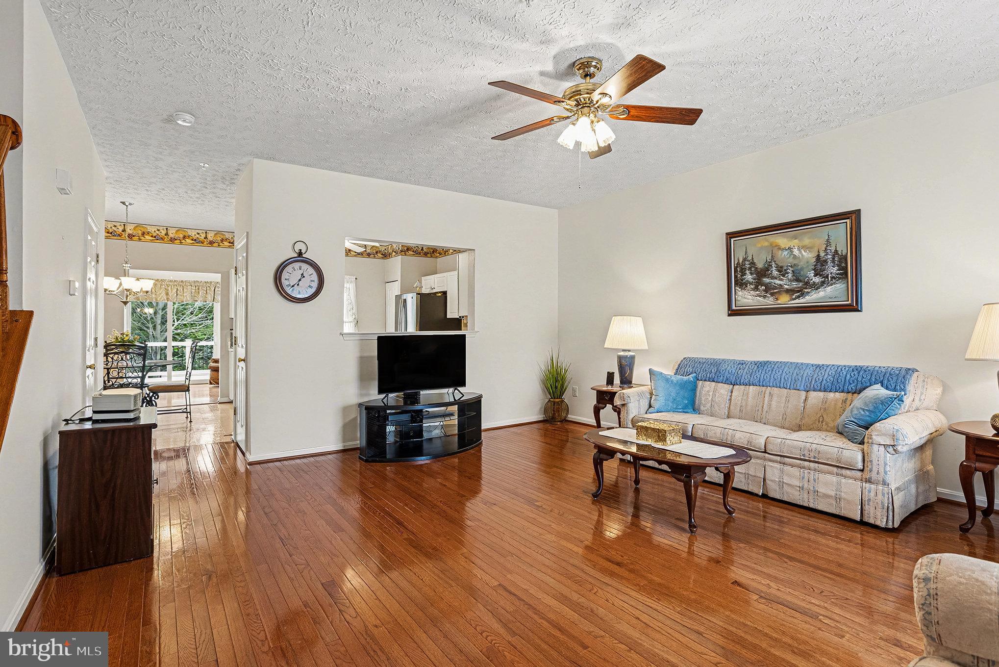 22 Oaksylvan Way Baltimore, MD 21236 - Photo 3 of 39 a living room with furniture and a flat screen tv