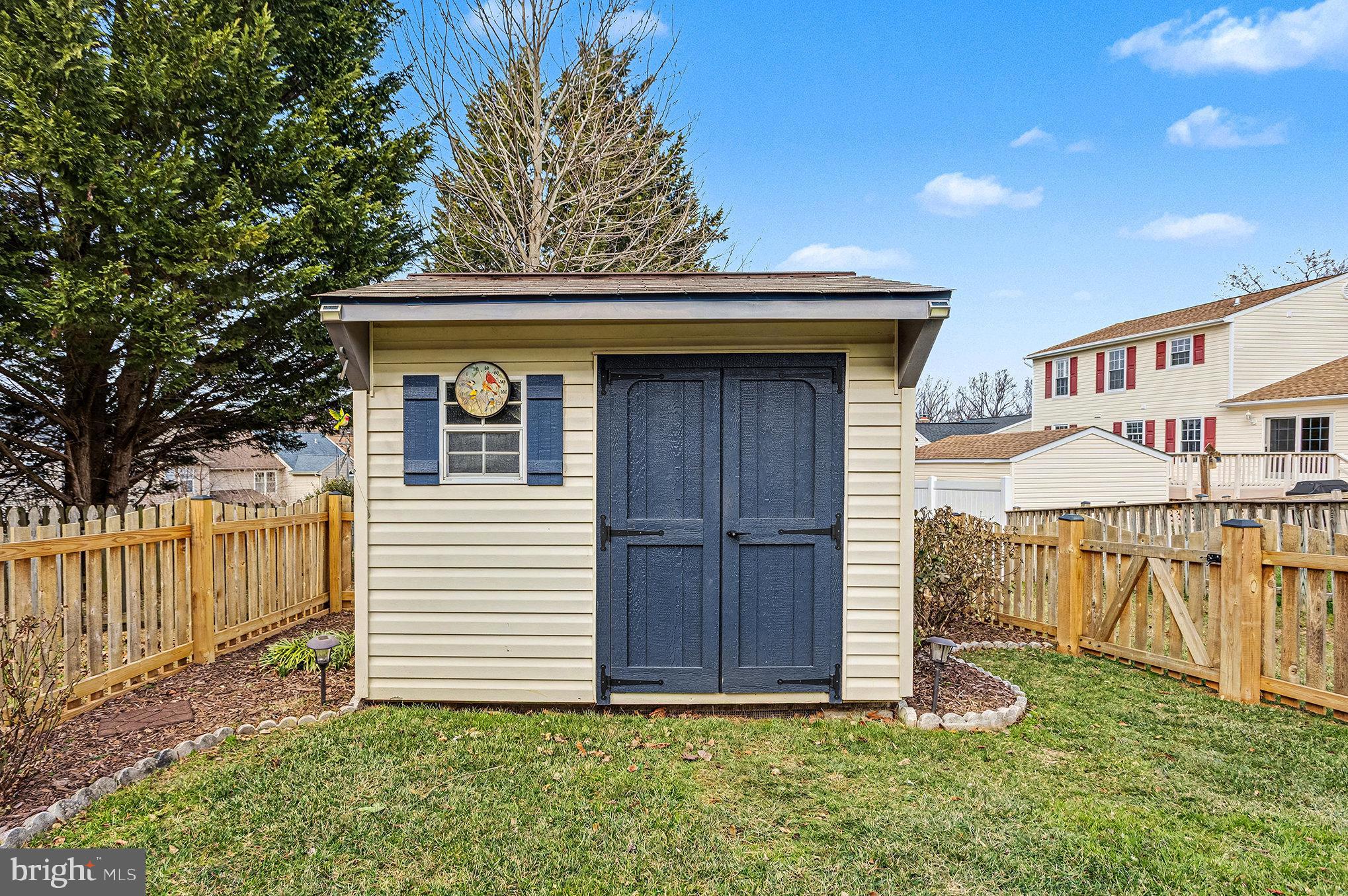 22 Oaksylvan Way Baltimore, MD 21236 - Photo 36 of 39 a front view of a house with a yard