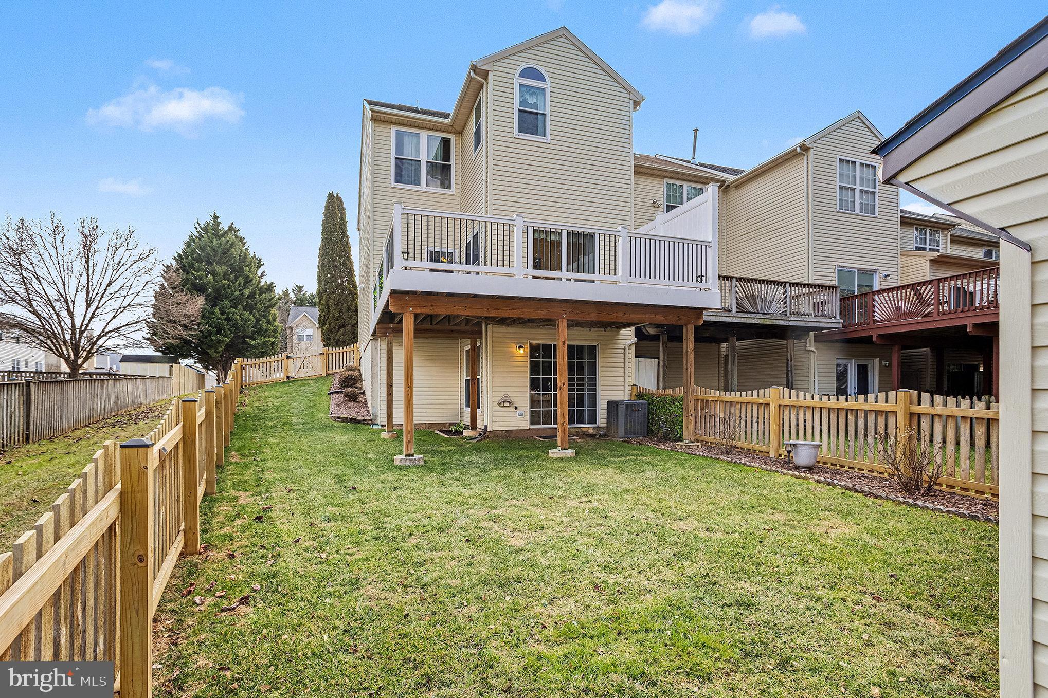22 Oaksylvan Way Baltimore, MD 21236 - Photo 38 of 39 a view of a house with a yard and plants