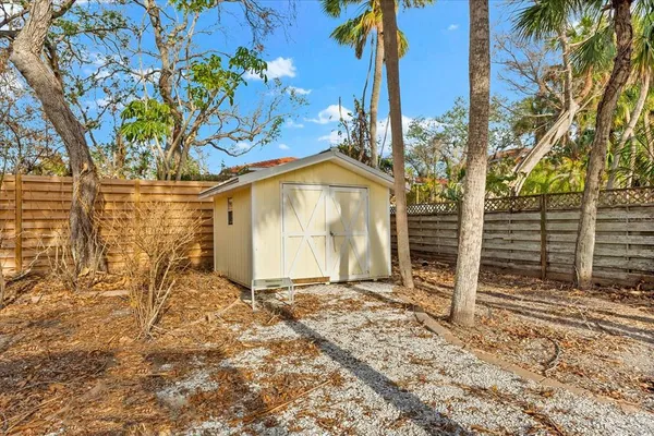 a view of a swimming pool with a backyard