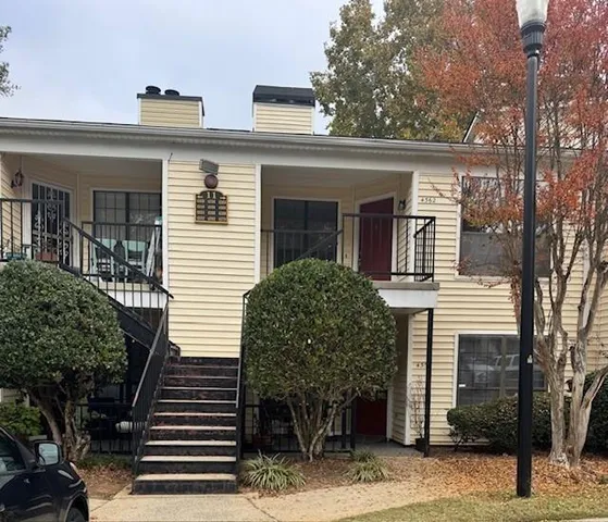 front view of a house with a small yard
