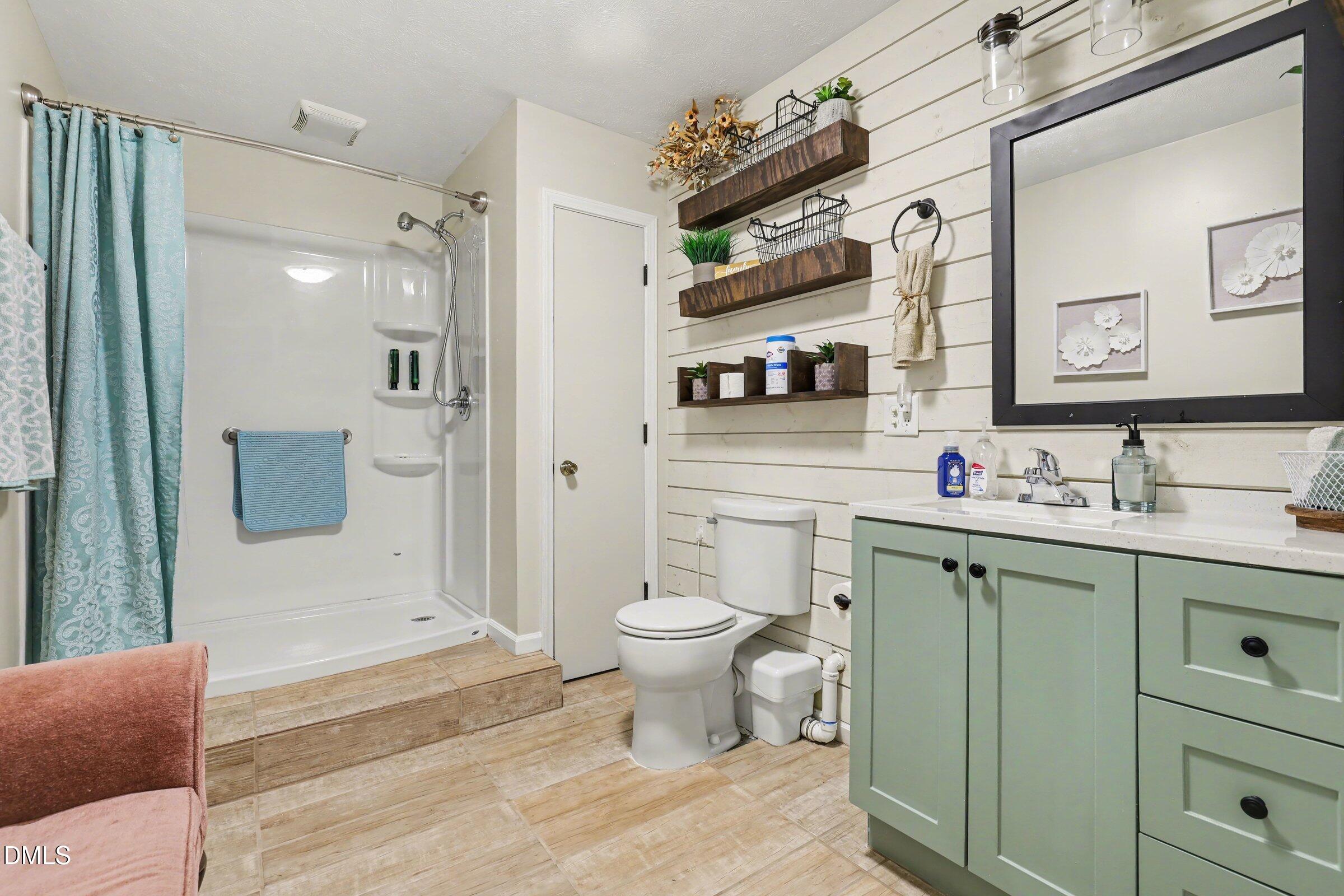 430 Fred Hall Road Stedman, NC 28391 - Photo 53 of 63 a bathroom with a sink toilet and shower
