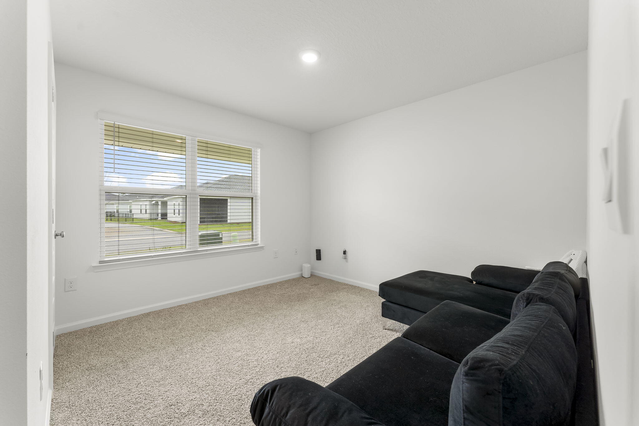 255 Riverwalk Circle Freeport, FL 32439 - Photo 17 of 40 a living room with furniture and a window