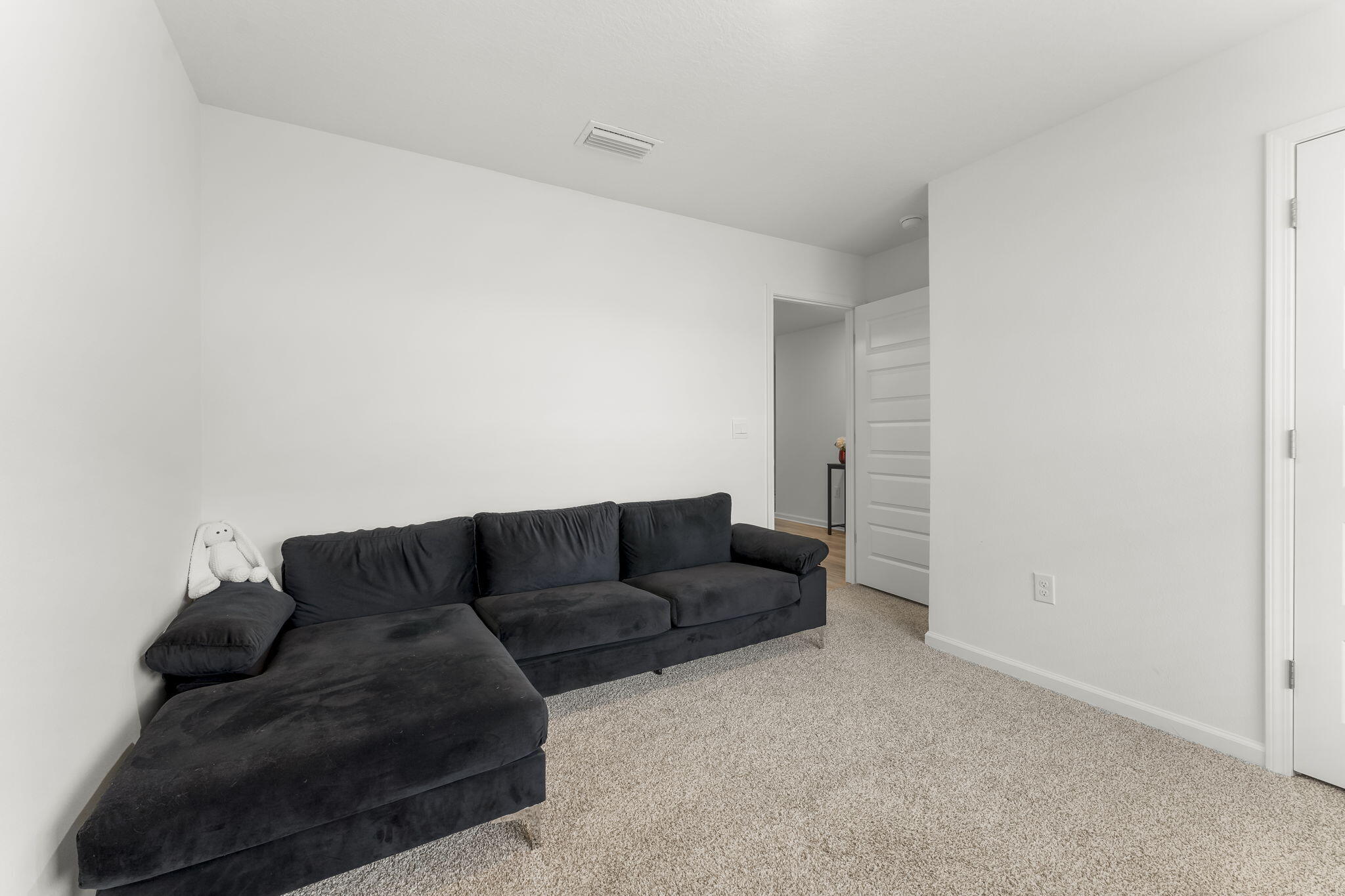 255 Riverwalk Circle Freeport, FL 32439 - Photo 18 of 40 a living room with furniture and a couch