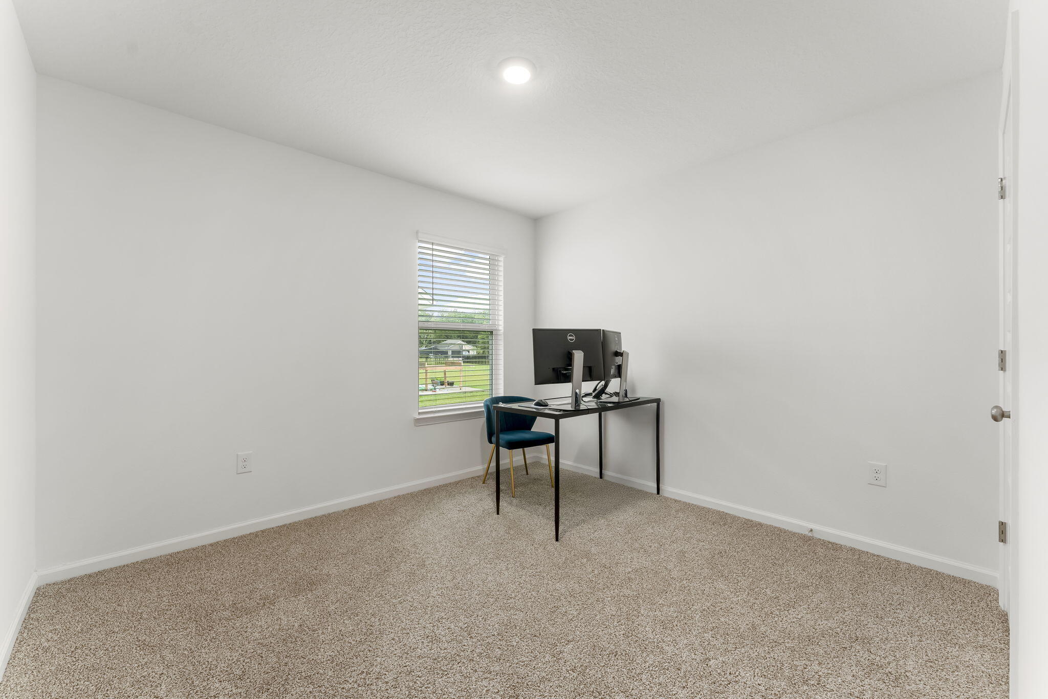 255 Riverwalk Circle Freeport, FL 32439 - Photo 20 of 40 a view of a workspace with furniture and a window