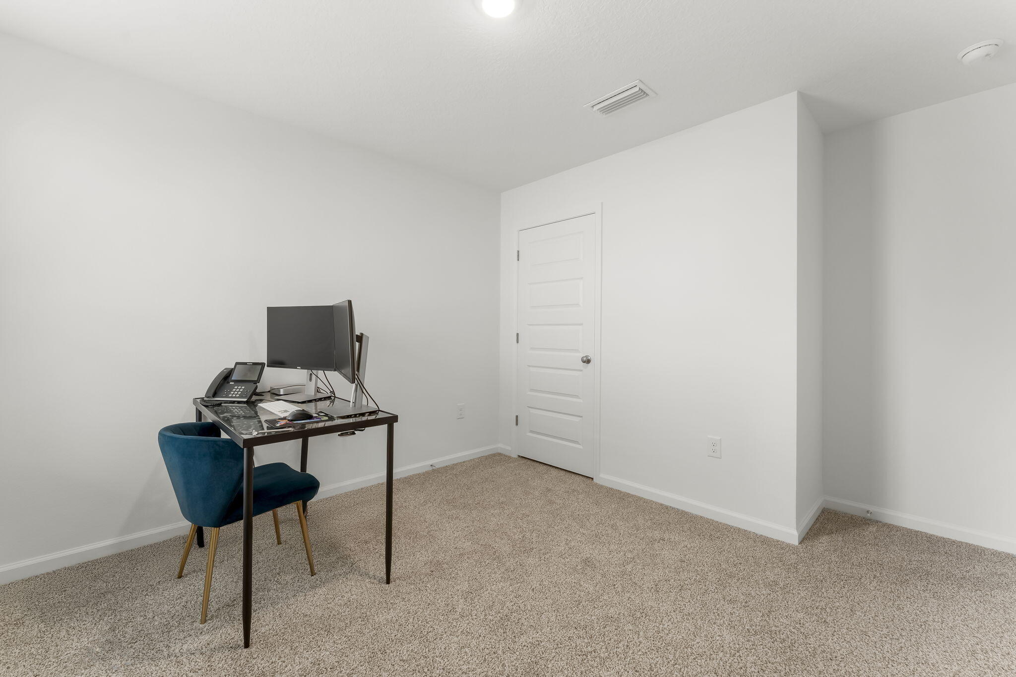 255 Riverwalk Circle Freeport, FL 32439 - Photo 21 of 40 a room with furniture and a chair