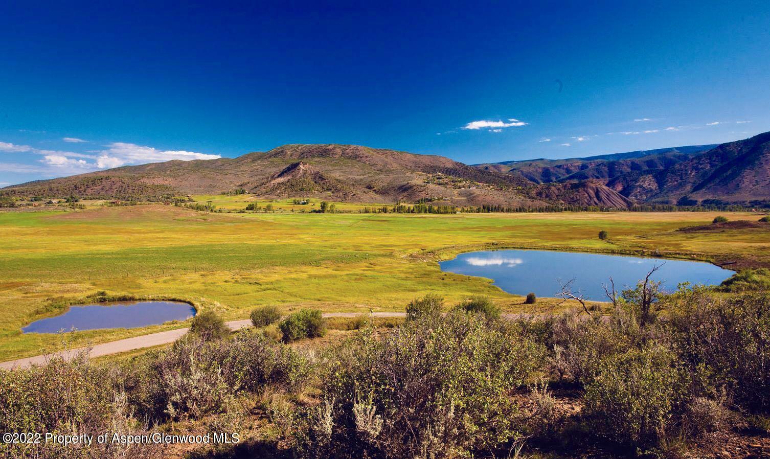 900 Lazy O Road Snowmass, CO 81654 - Photo 26 of 30 One of Several Stocked Ponds