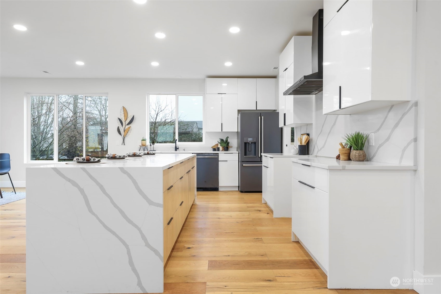 11639 Beacon Avenue South Seattle, WA 98178 - Photo 11 of 35 a kitchen with stainless steel appliances a refrigerator sink and white cabinets