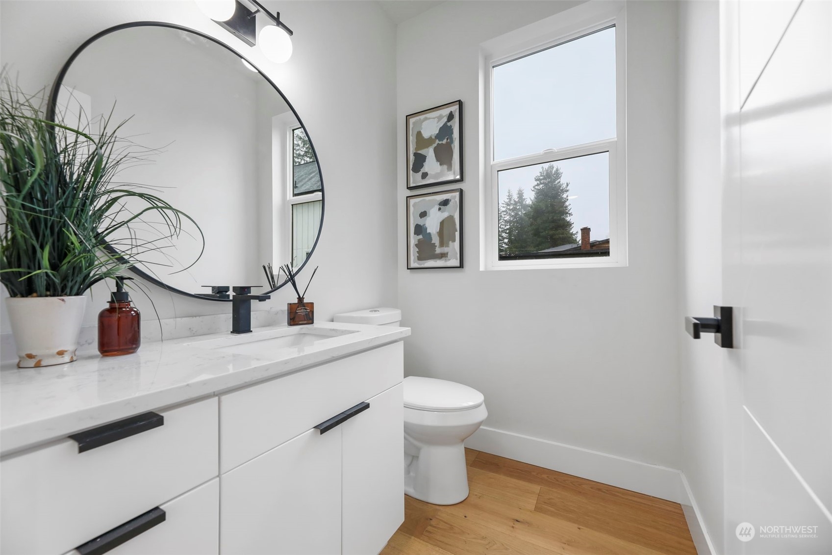 11639 Beacon Avenue South Seattle, WA 98178 - Photo 15 of 35 a bathroom with a toilet a sink and mirror