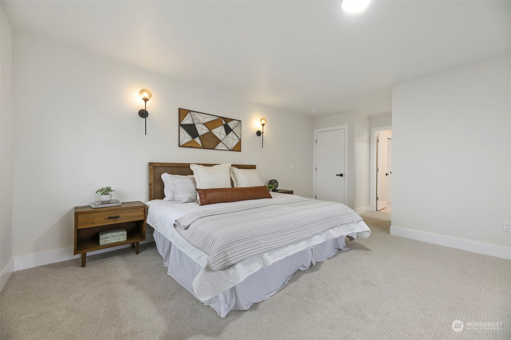 11639 Beacon Avenue South Seattle, WA 98178 - Photo 20 of 35 a bedroom with a bed and a painting on the wall