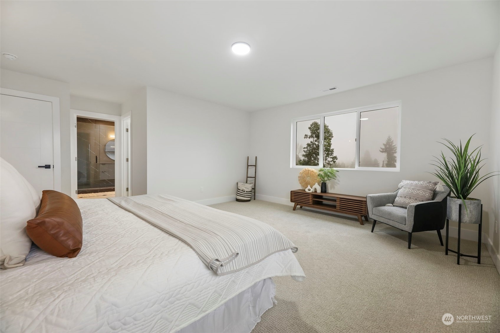 11639 Beacon Avenue South Seattle, WA 98178 - Photo 21 of 35 a bedroom with a bed and window
