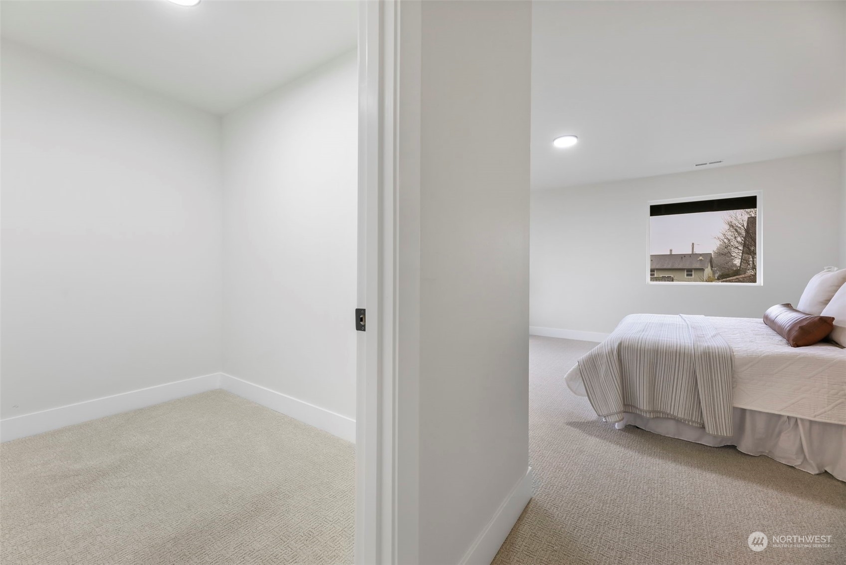 11639 Beacon Avenue South Seattle, WA 98178 - Photo 22 of 35 a bedroom with a bed and a night stand