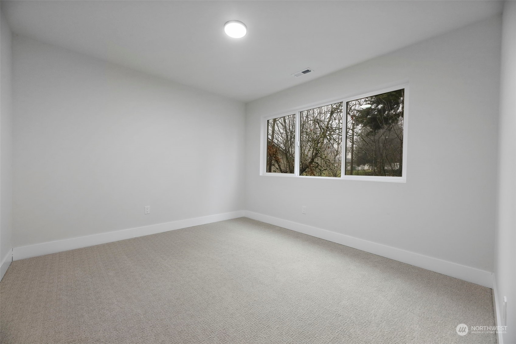 11639 Beacon Avenue South Seattle, WA 98178 - Photo 28 of 35 an empty room with a window