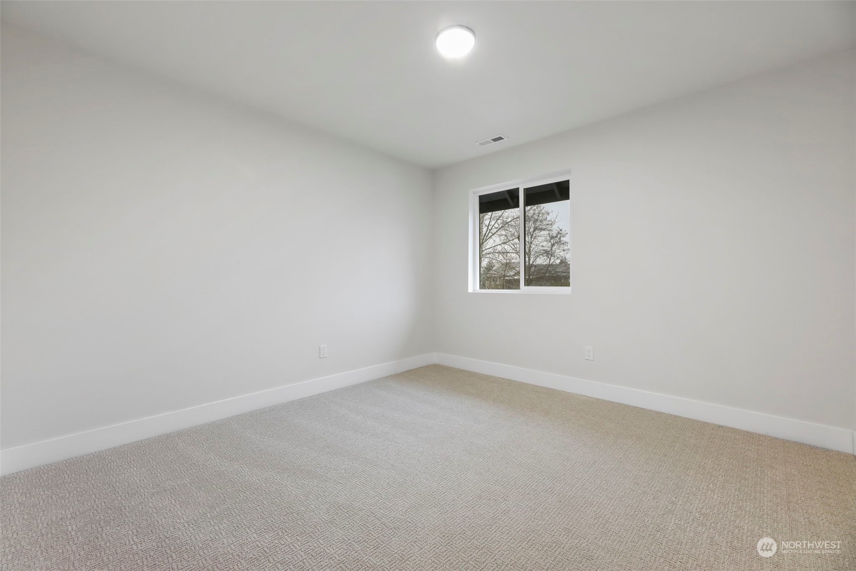 11639 Beacon Avenue South Seattle, WA 98178 - Photo 30 of 35 an empty room with a window
