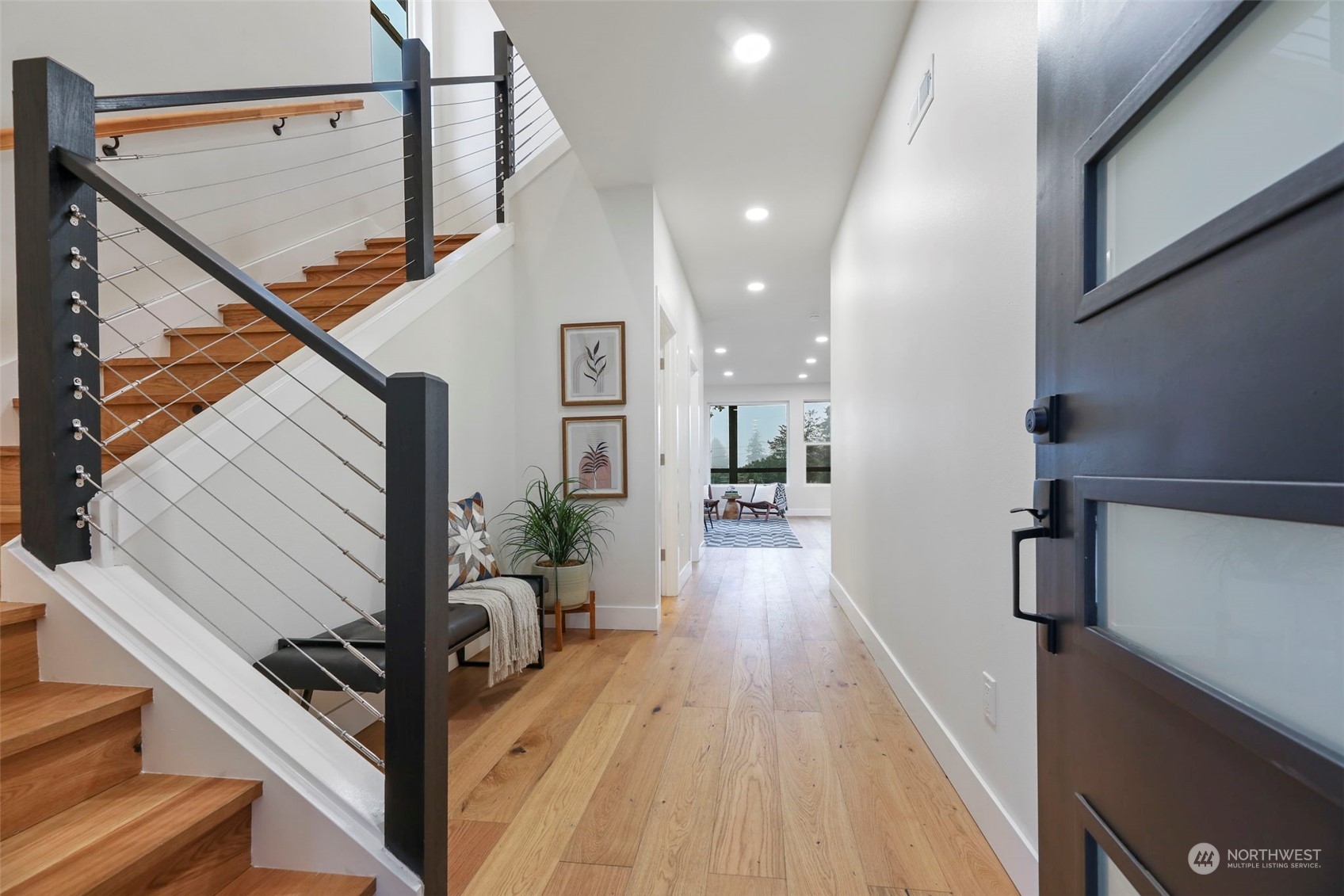 11639 Beacon Avenue South Seattle, WA 98178 - Photo 3 of 35 a view of a hallway with wooden floor and staircase