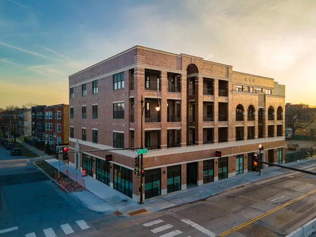 a front view of a building with balcony