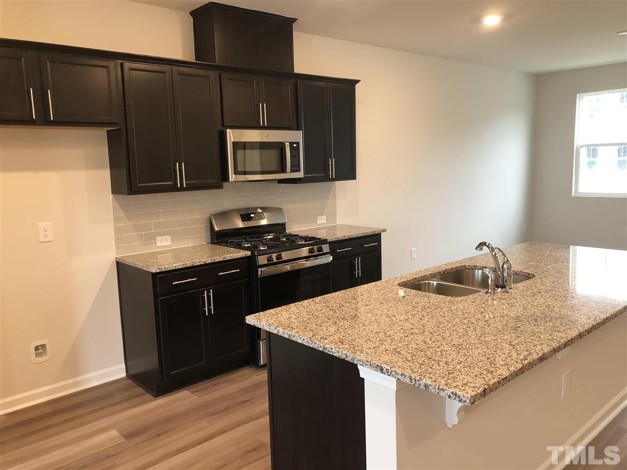 6307 Perry Creek Road, Unit 2299 Raleigh, NC 27616 - Photo 2 of 20 photos are not of actual home but are to show the same design selections for this home.