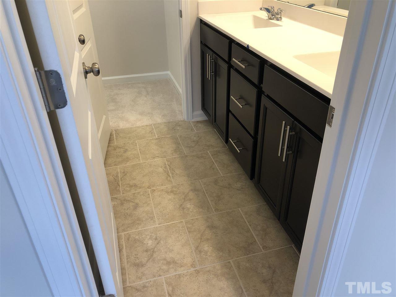 6307 Perry Creek Road, Unit 2299 Raleigh, NC 27616 - Photo 6 of 20 photos are not of actual home but are to show the same design selections for this home.