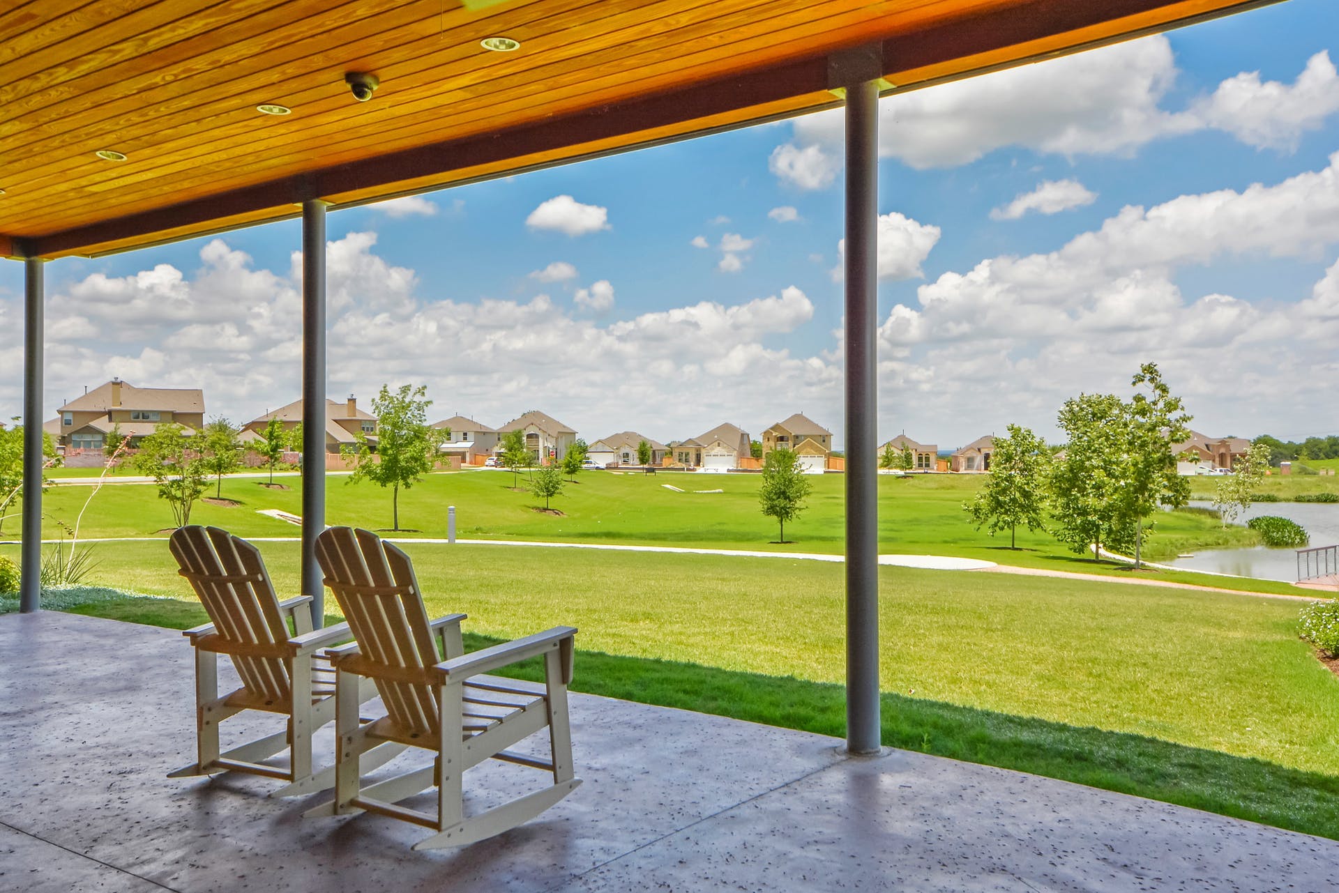 2004 Autumn Run Lane Round Rock, TX 78665 - Photo 31 of 37 Enjoy tranquil water views from this expansive covered patio, perfect for relaxed outdoor living.