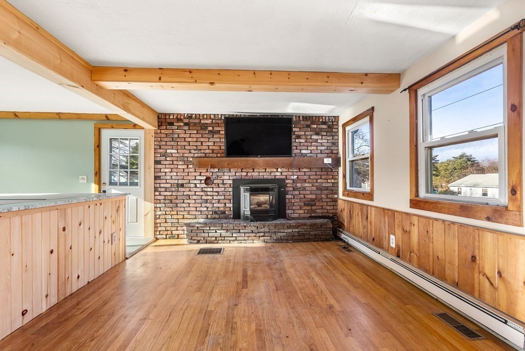 4 Meadow Lane Three Rivers, MA 01080 - Photo 11 of 23 a view of an empty room with wooden floor and a window