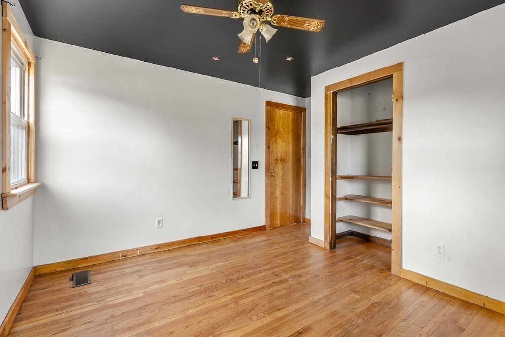 4 Meadow Lane Three Rivers, MA 01080 - Photo 17 of 23 wooden floor in an empty room with a window