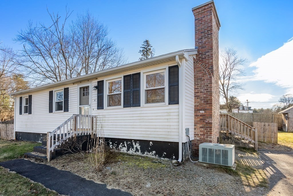 4 Meadow Lane Three Rivers, MA 01080 - Photo 2 of 23 a front view of a house with plants