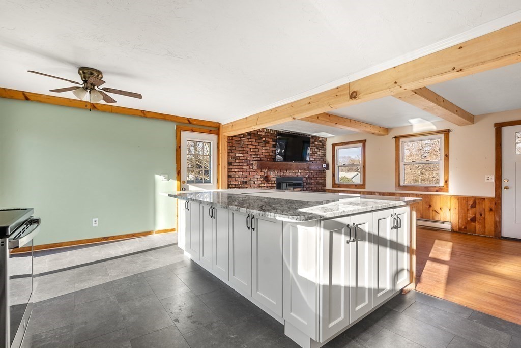 4 Meadow Lane Three Rivers, MA 01080 - Photo 6 of 23 a kitchen with stainless steel appliances granite countertop a stove and a sink