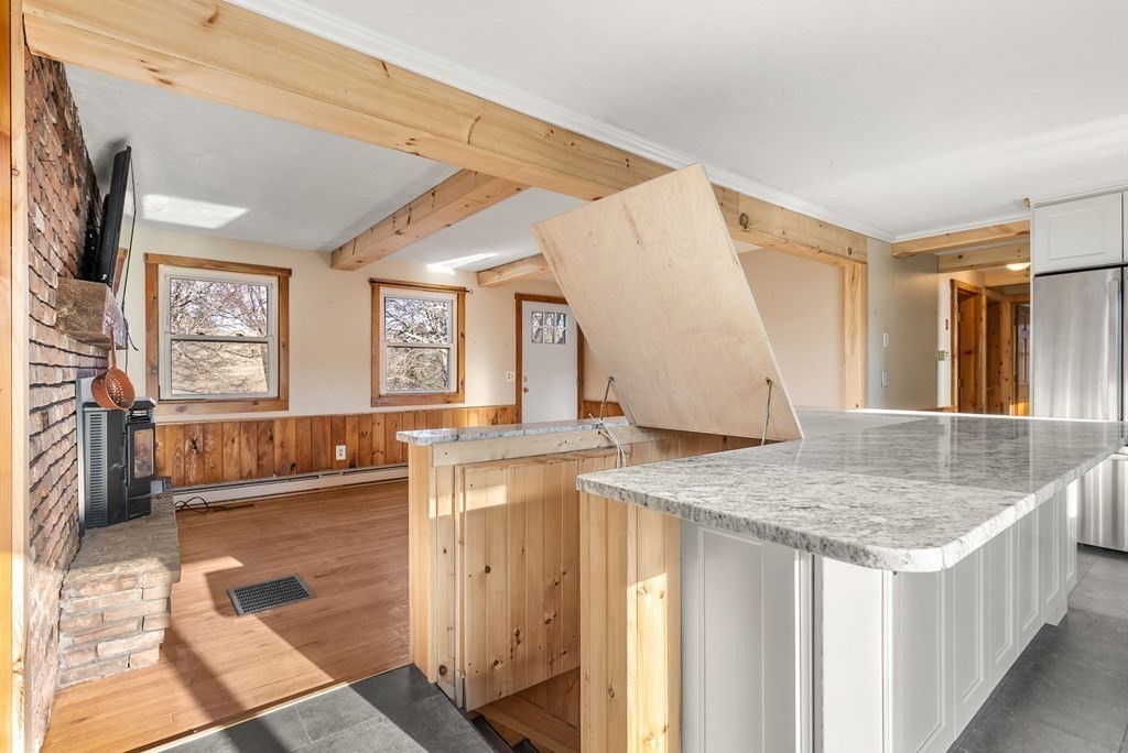 4 Meadow Lane Three Rivers, MA 01080 - Photo 7 of 23 a view of living room with granite countertop furniture and fireplace