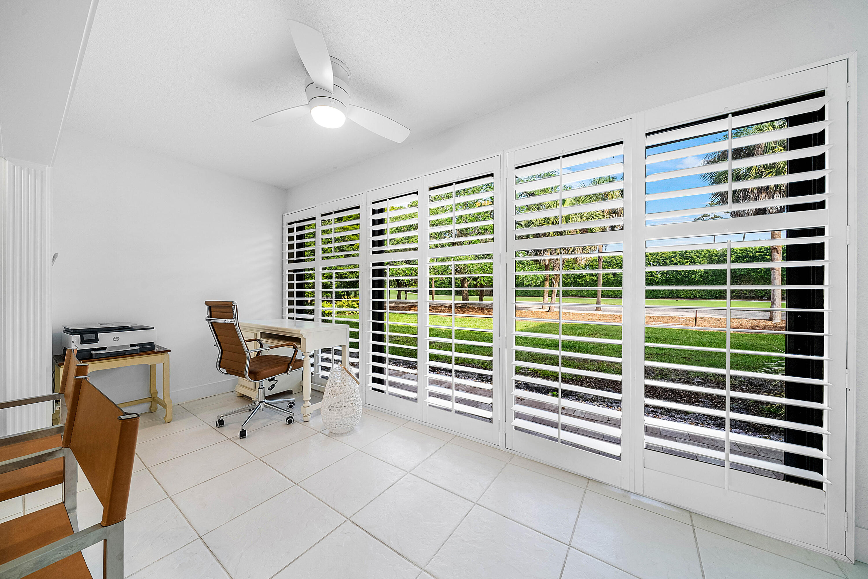 4249 North Quail Ridge Drive, Unit A Boynton Beach, FL 33436 - Photo 11 of 49 a view of a livingroom with workspace