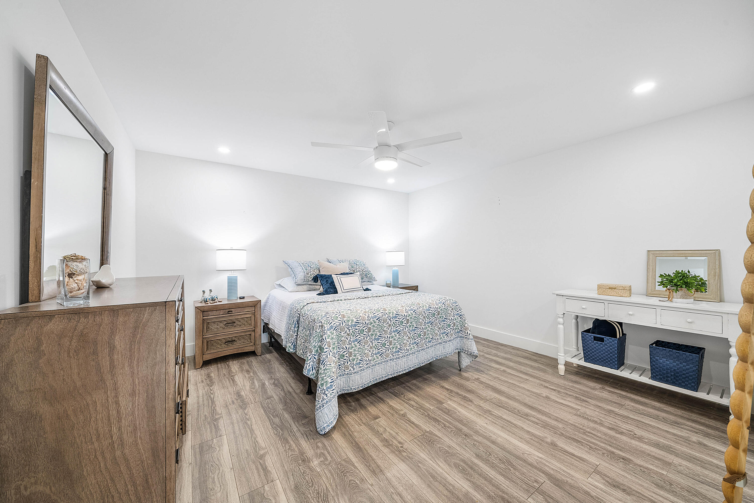 4249 North Quail Ridge Drive, Unit A Boynton Beach, FL 33436 - Photo 26 of 49 a spacious bedroom with a bed and a fireplace