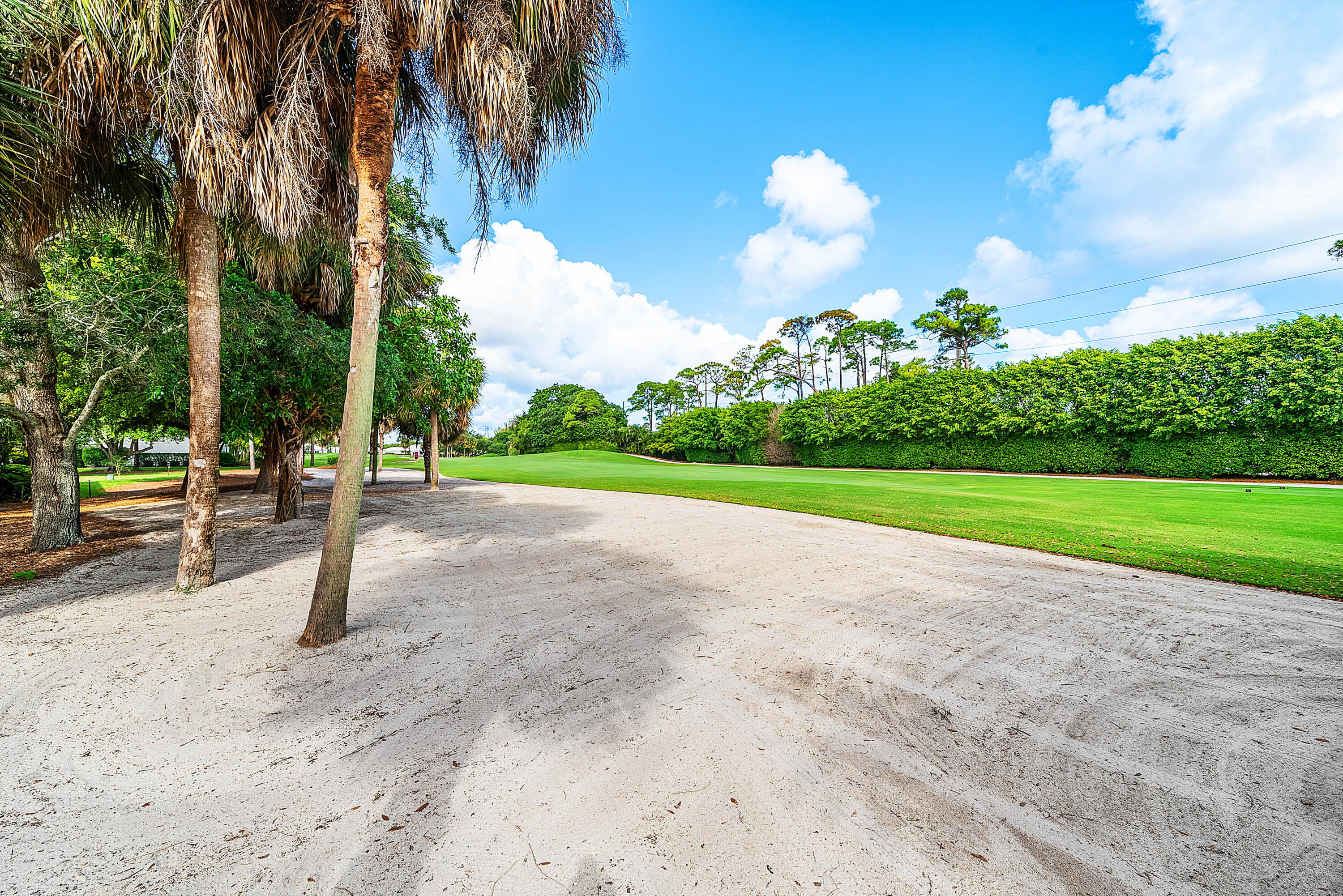 4249 North Quail Ridge Drive, Unit A Boynton Beach, FL 33436 - Photo 36 of 49 a view of a park with swings and slides