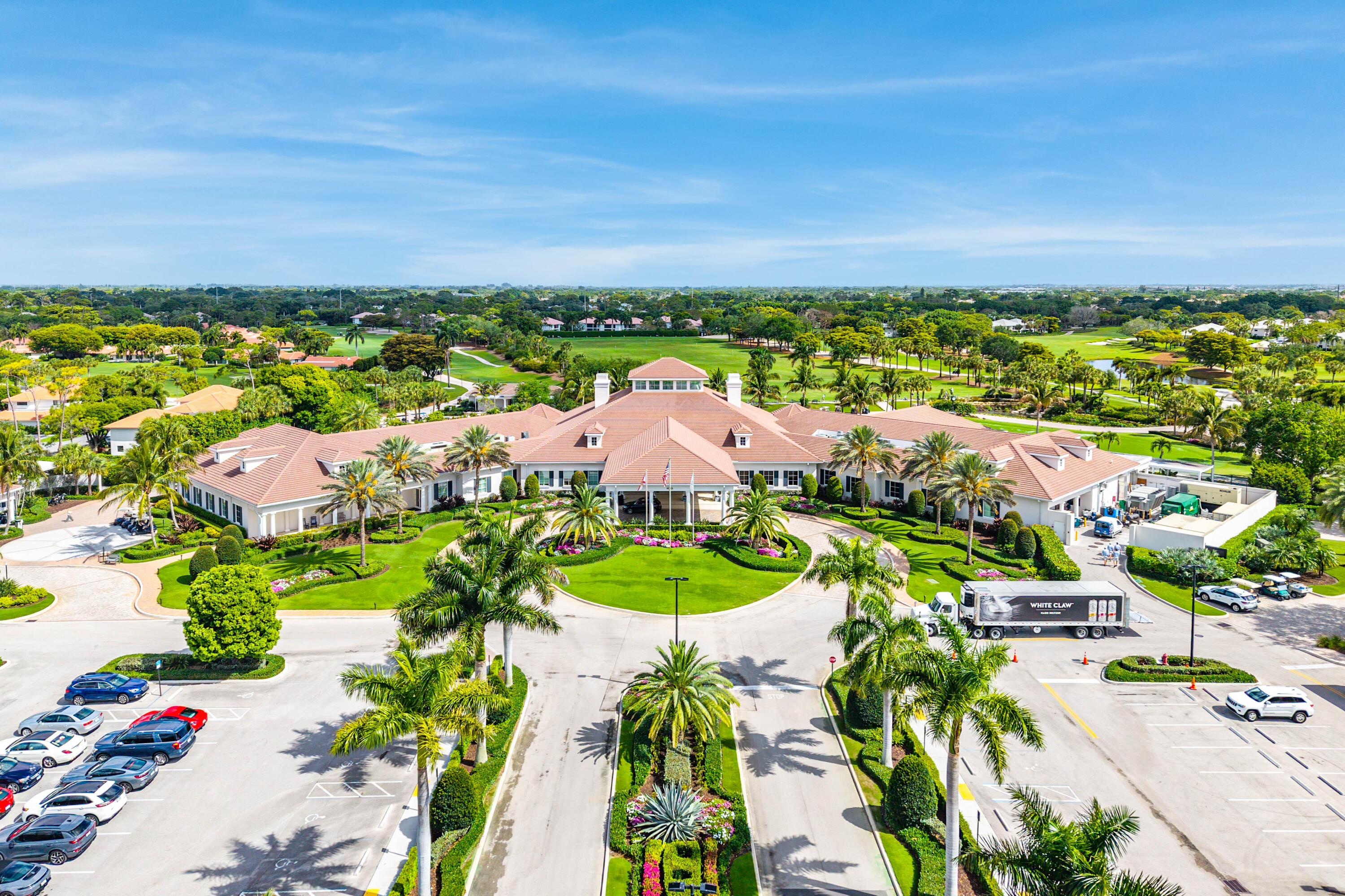 4249 North Quail Ridge Drive, Unit A Boynton Beach, FL 33436 - Photo 38 of 49 an aerial view of residential houses with outdoor space and trees all around