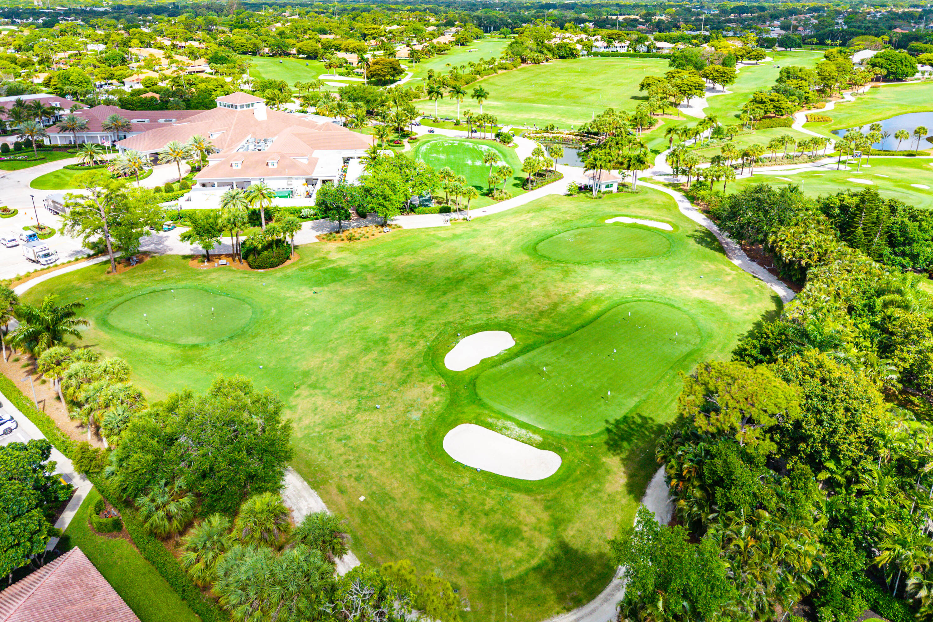 4249 North Quail Ridge Drive, Unit A Boynton Beach, FL 33436 - Photo 44 of 49 a view of a golf course with a tree