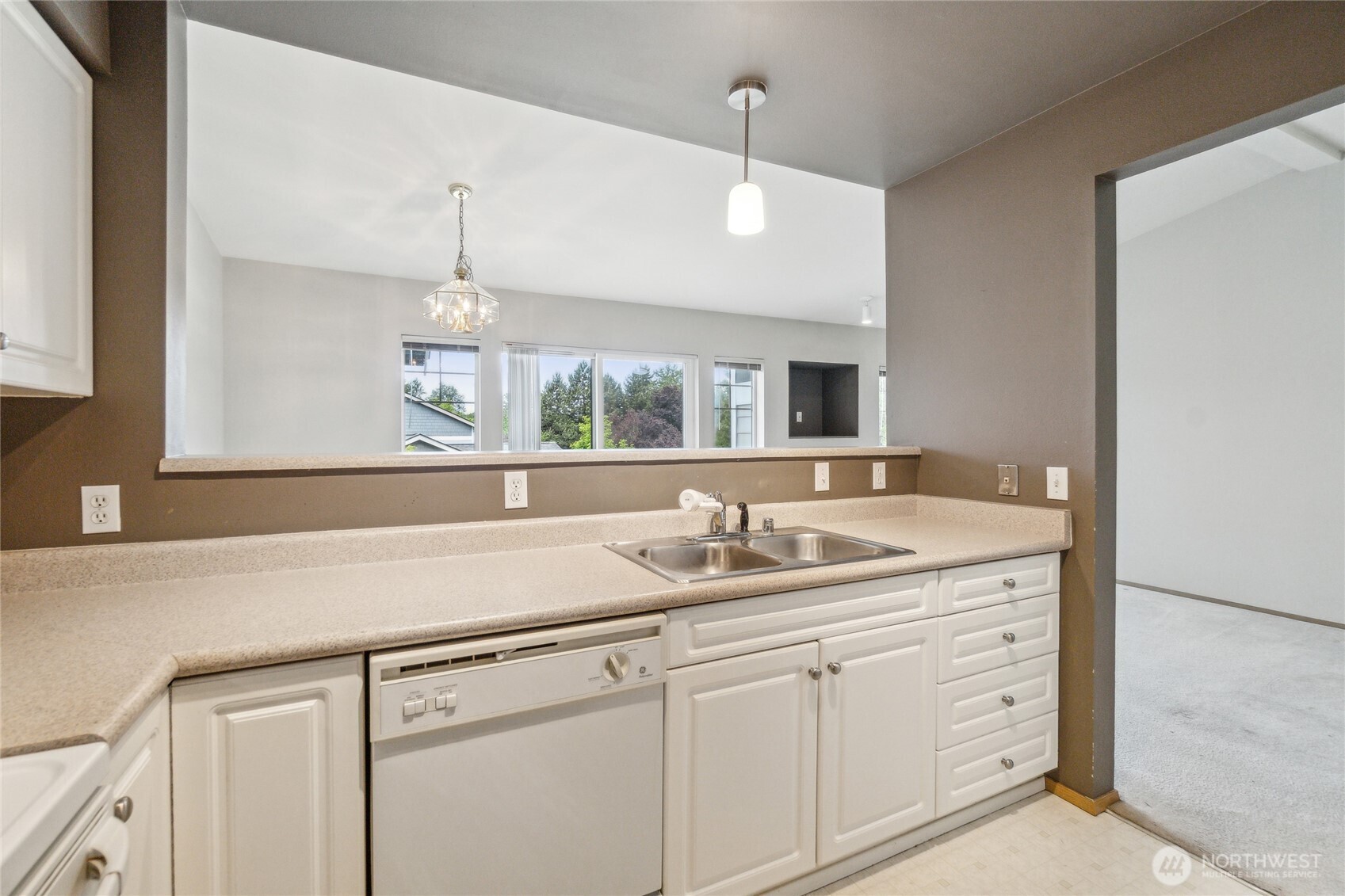 15150 140th Way Southeast, Unit T304 Renton, WA 98058 - Photo 11 of 30 a bathroom with a sink and a mirror