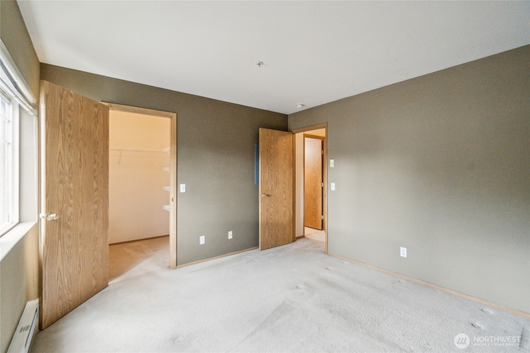 15150 140th Way Southeast, Unit T304 Renton, WA 98058 - Photo 13 of 30 a view of an empty room and a window