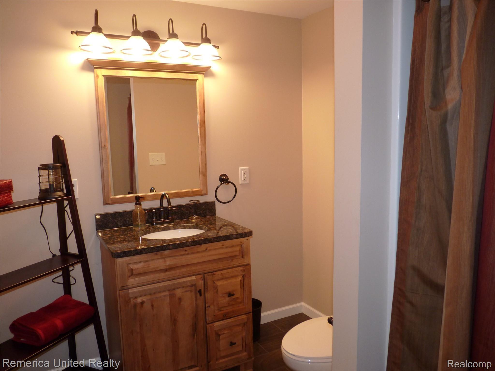 945 Old Plank Road Milford, MI 48381 - Photo 21 of 26 LOWER LEVEL BATH
