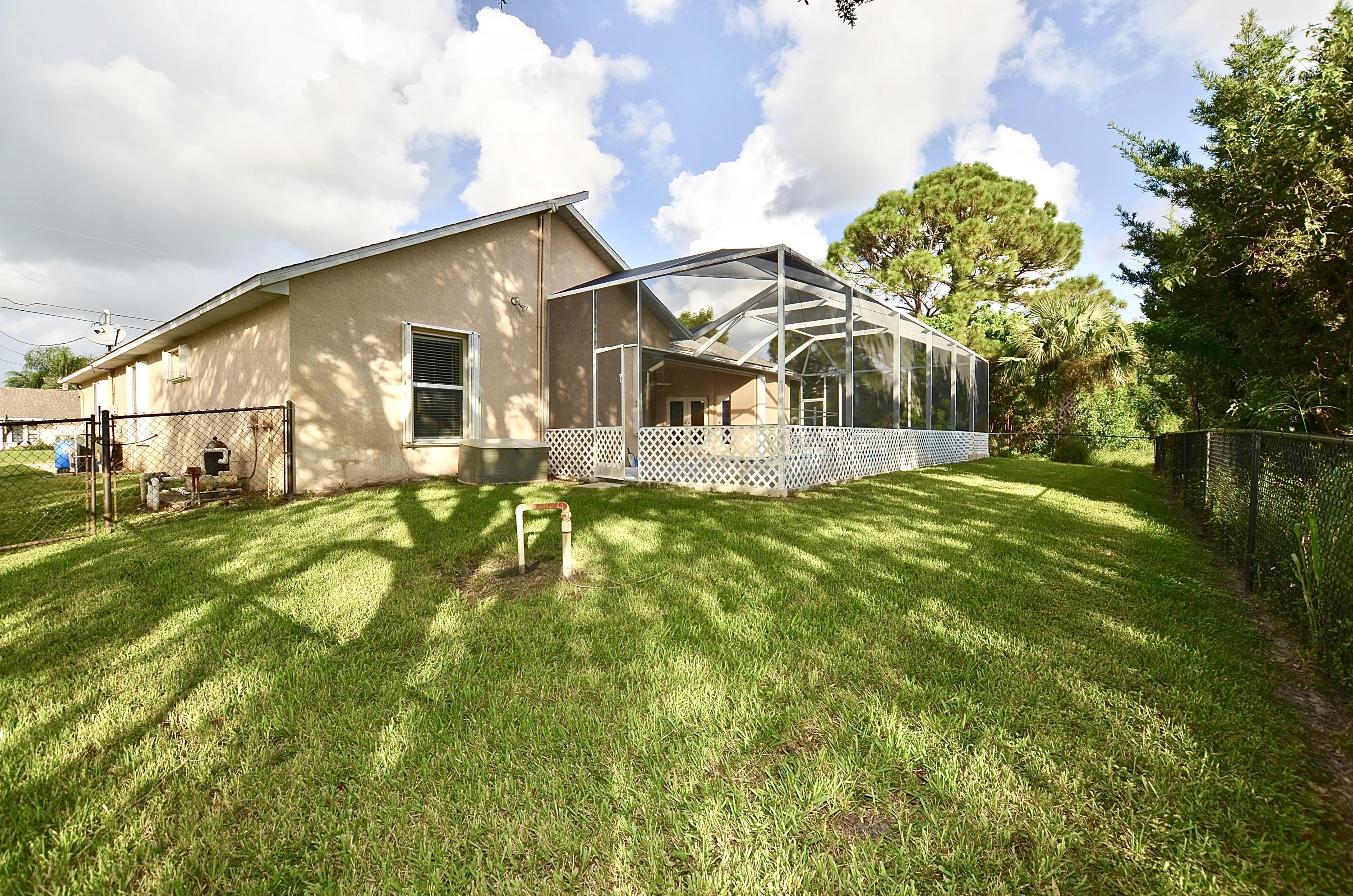 331 Southeast Fisk Road Port St. Lucie, FL 34984 - Photo 26 of 28 Fenced Yard