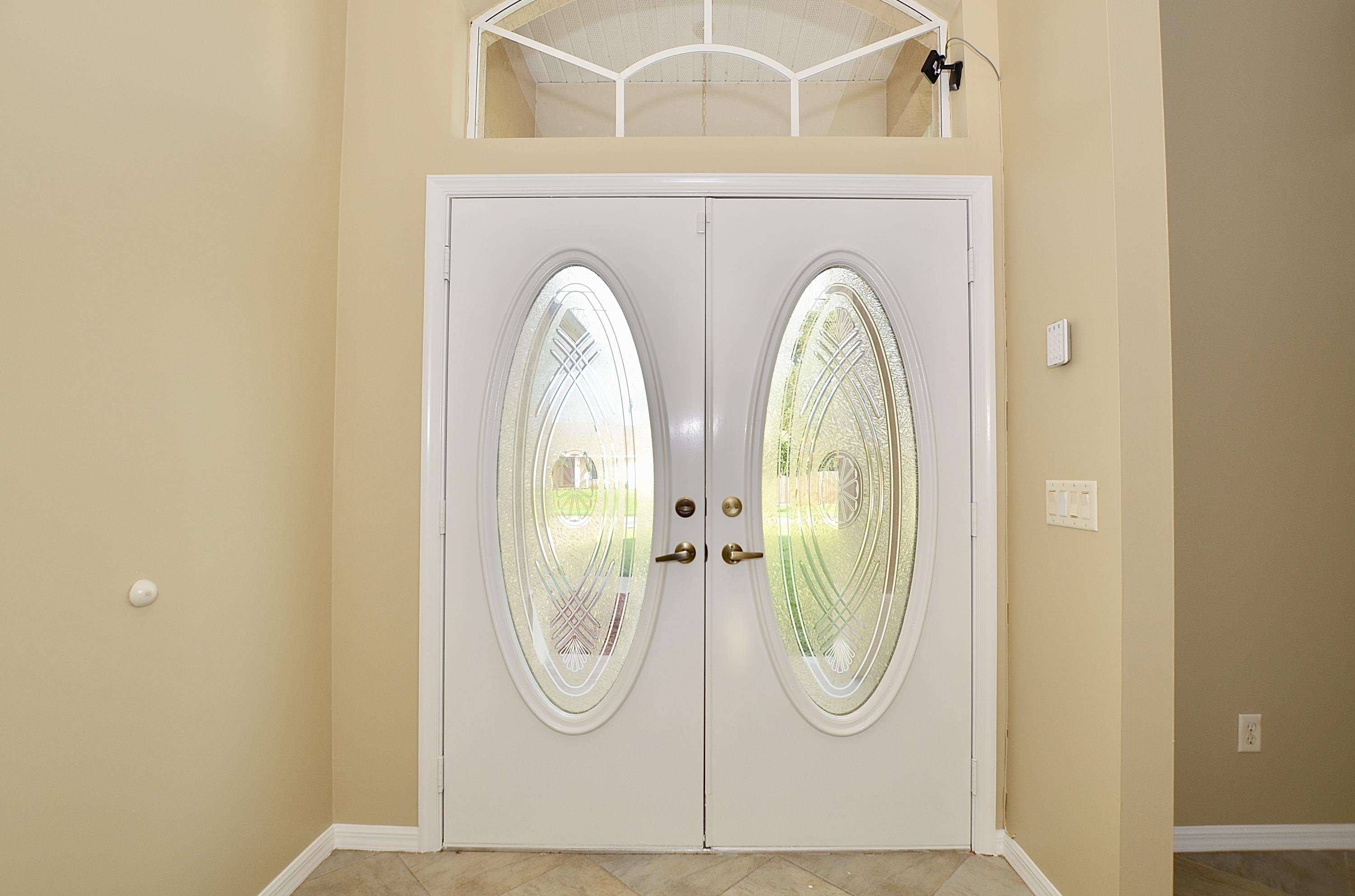 331 Southeast Fisk Road Port St. Lucie, FL 34984 - Photo 6 of 28 Front Door