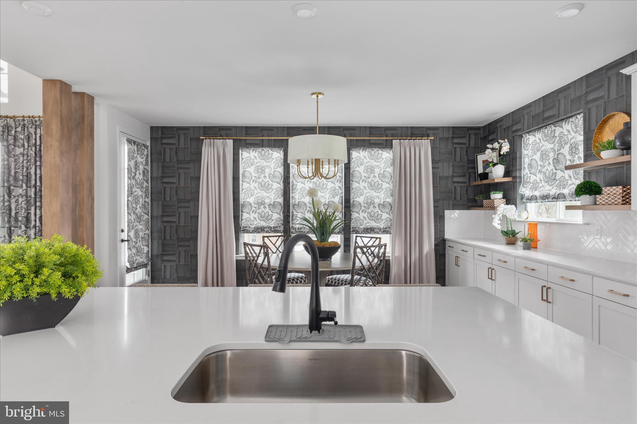 174 Williamson Road Winchester, VA 22602 - Photo 15 of 67 a kitchen with a sink and a large window
