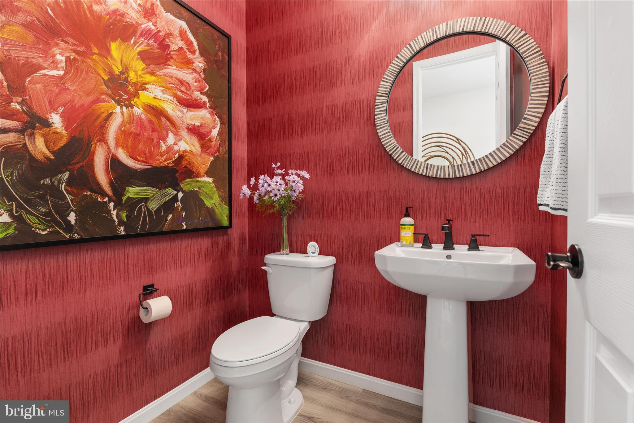 174 Williamson Road Winchester, VA 22602 - Photo 16 of 67 a bathroom with a toilet sink and mirror