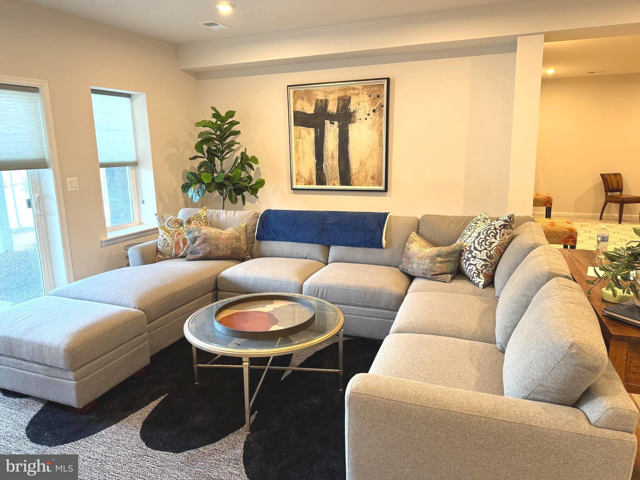 174 Williamson Road Winchester, VA 22602 - Photo 27 of 67 a living room with furniture and a large window