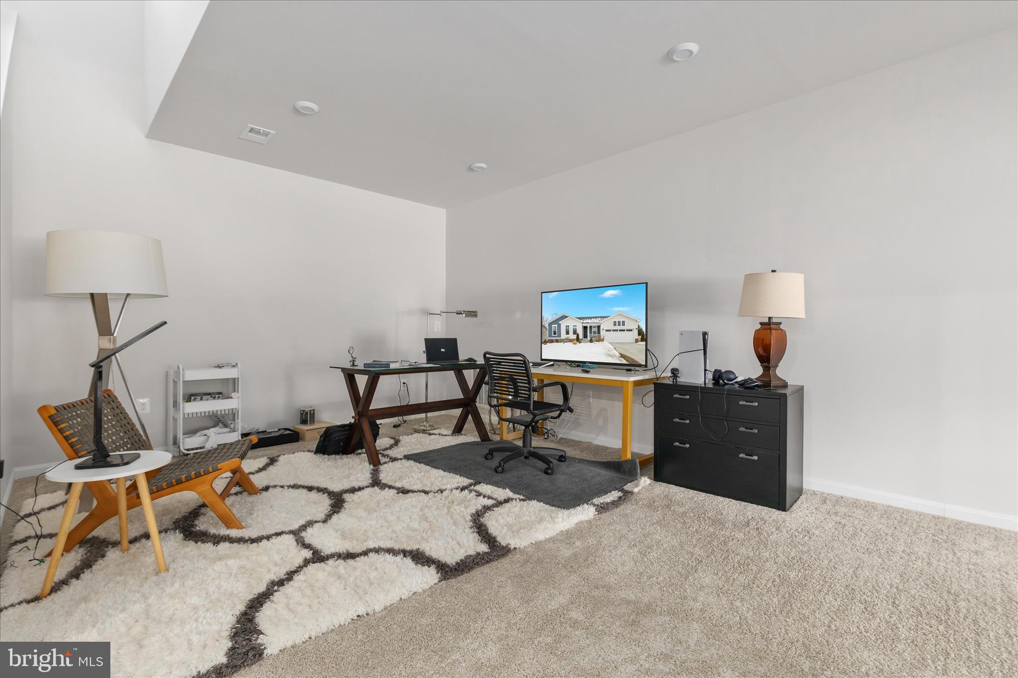 174 Williamson Road Winchester, VA 22602 - Photo 33 of 67 a room with gym equipment and a mirror