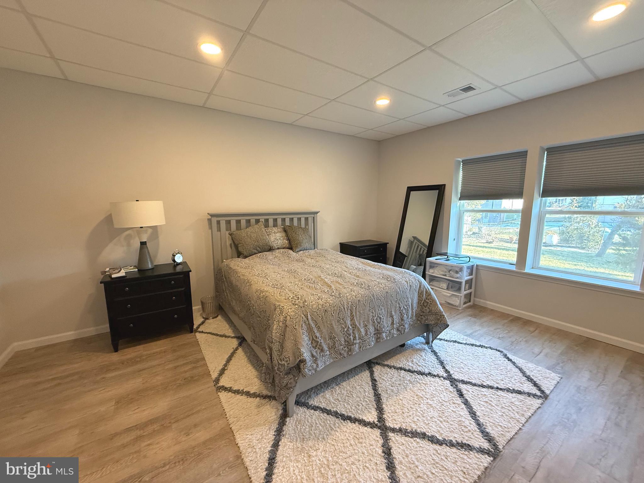 174 Williamson Road Winchester, VA 22602 - Photo 35 of 67 a bed room with a bed and a chair