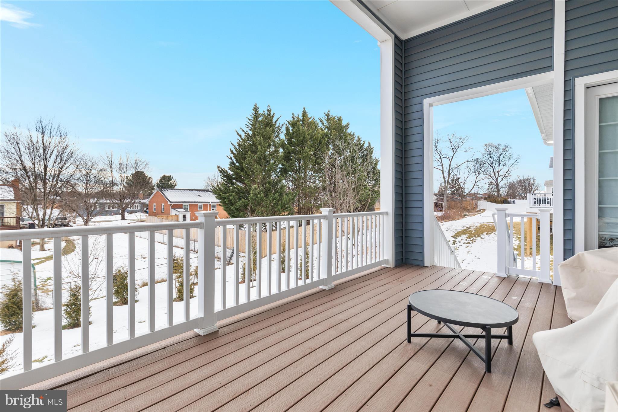 174 Williamson Road Winchester, VA 22602 - Photo 40 of 67 a view of a balcony with wooden floor and outdoor seating