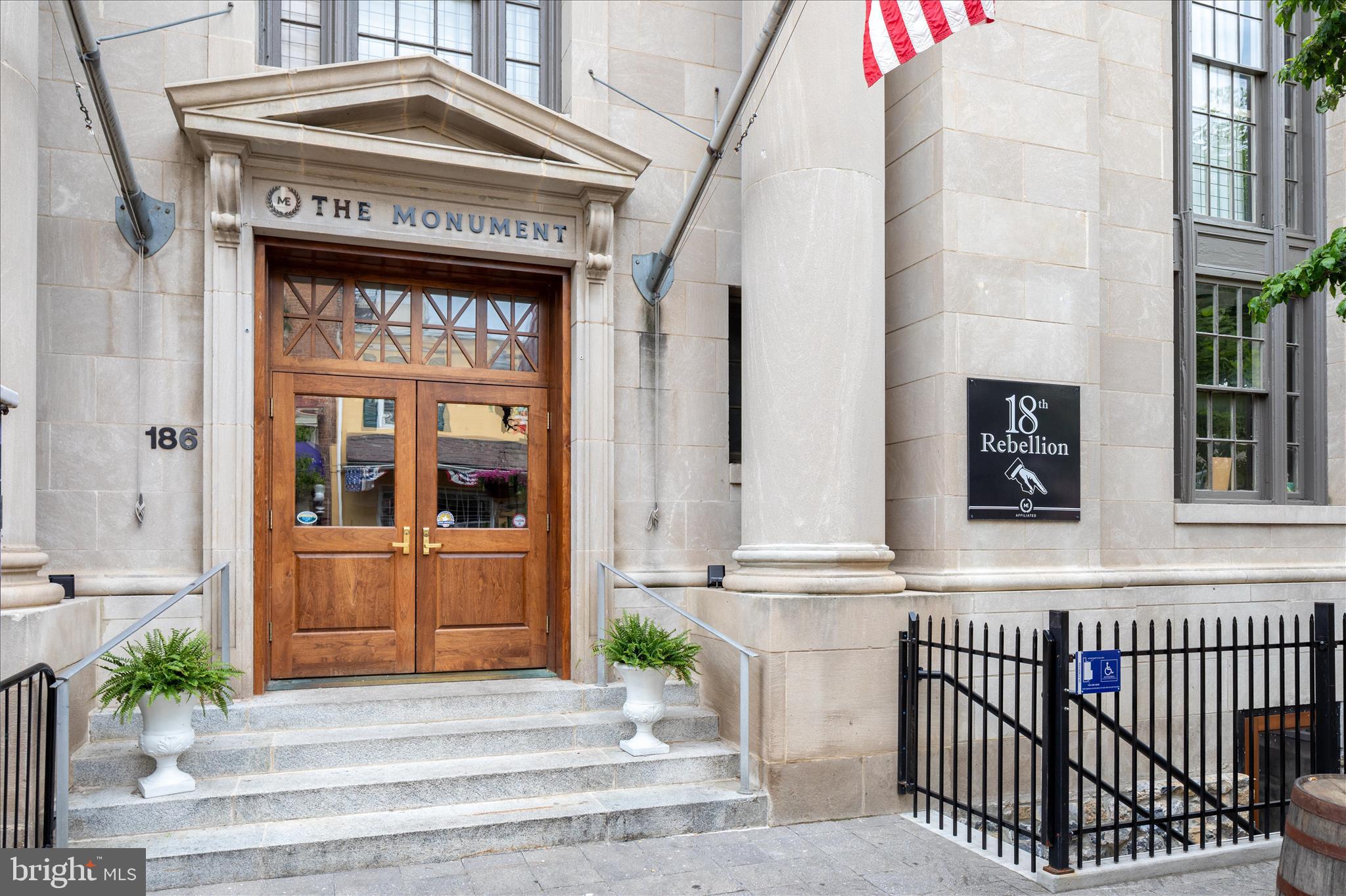 174 Williamson Road Winchester, VA 22602 - Photo 65 of 67 a front view of a building with a entrance door