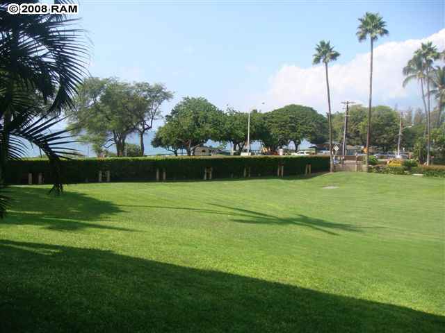 2695 South Kihei Road, Unit 10103 Kihei, HI 96753 - Photo 3 of 8 a view of a golf course with a lake