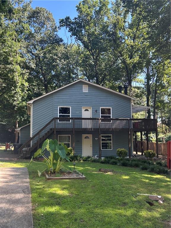 front view of a house with a yard