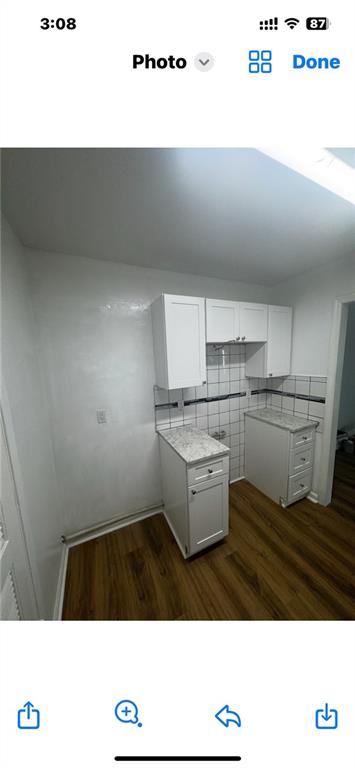 1230 Hanover Place Alpharetta, GA 30009 - Photo 18 of 29 a open kitchen with kitchen island sink and stove