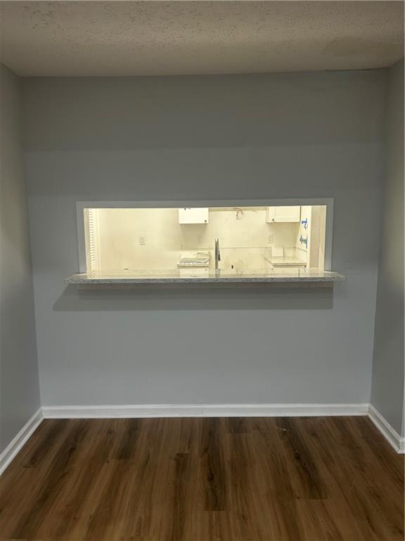 1230 Hanover Place Alpharetta, GA 30009 - Photo 21 of 29 a view of an empty room and wooden floor